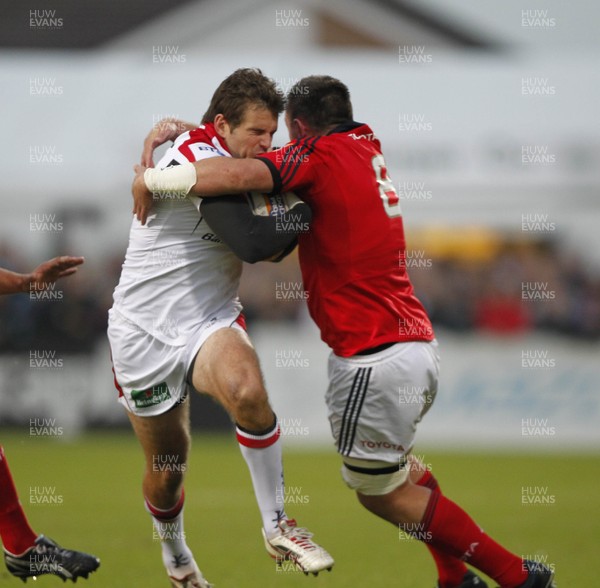 140912  Ulster v Munster - RaboDirect Pro12  Jared Payne of Ulster tackled by James Coughlan of Munster