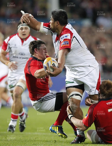 140912  Ulster v Munster - RaboDirect Pro12  Nick Williams of Ulster tackled by Munster's Ian Keatley and Sean Dougall