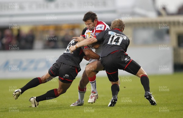 240812 - Ulster v Newcastle Falcons - Preseason Friendly -Jared Payne of Ulster tackled by Suka Hufanga and Alex Tait of Newcastle