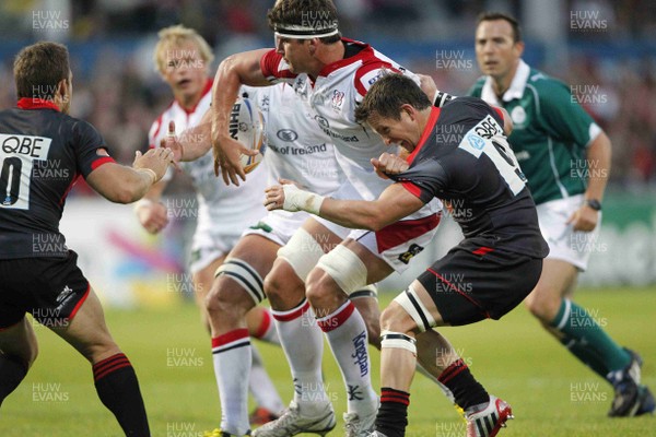 240812 - Ulster v Newcastle Falcons - Preseason Friendly -Robbie Diack of Ulster offloads in the tackle as Rory Lawson of Newcastle tackles