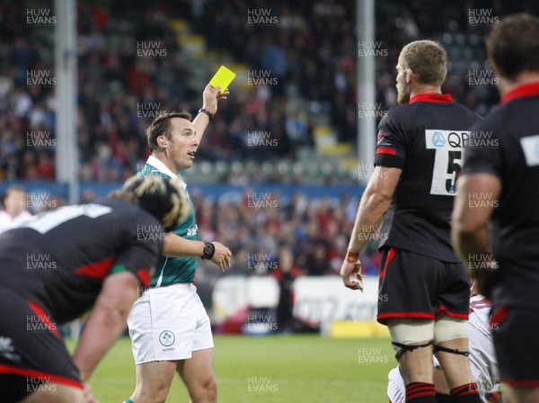 240812 - Ulster v Newcastle Falcons - Preseason Friendly -James Hudson of Newcastle receives a yellow card from referee Leo Colgan (IRFU)