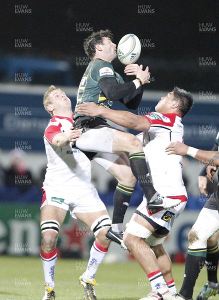 151212 Ulster v Northampton - Heineken Cup - Ben Foden of Northampton beats Chris Henry and Nick Williams of Ulster to the high ball 