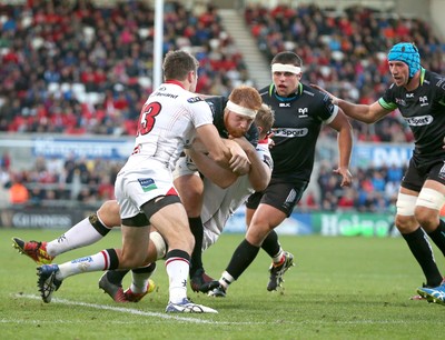 011016 Ulster v Ospreys -Ospreys Dan Baker is tackled by Jared Payne