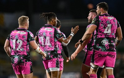 040426 - Ulster v Ospreys - EPCR Challenge Cup Round of 16 - Daniel Kasende of Ospreys, 14, celebrates with teammates after scoring their side's second try