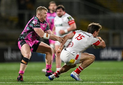 040426 - Ulster v Ospreys - EPCR Challenge Cup Round of 16 - Ethan McIlroy of Ulster is tackled by Sam Parry of Ospreys
