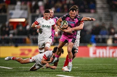 040426 - Ulster v Ospreys - EPCR Challenge Cup Round of 16 - Luke Morgan of Ospreys is tackled by Ethan McIlroy, left, and Iain Henderson of Ulster