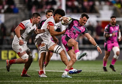 040426 - Ulster v Ospreys - EPCR Challenge Cup Round of 16 - Luke Morgan of Ospreys is tackled by Cormac Izuchukwu, centre, and Nick Timoney of Ulster