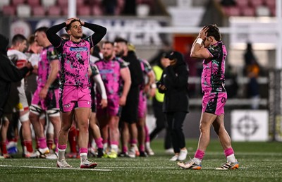 040426 - Ulster v Ospreys - EPCR Challenge Cup Round of 16 - Dan Edwards, right, and Kieran Hardy of Ospreys react after the match