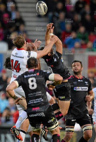 040915 - Ulster v Ospreys - Guinness Pro 12 -Tom Habberfield of Ospreys and Andrew Trimble of Ulster compete for an aerial ball