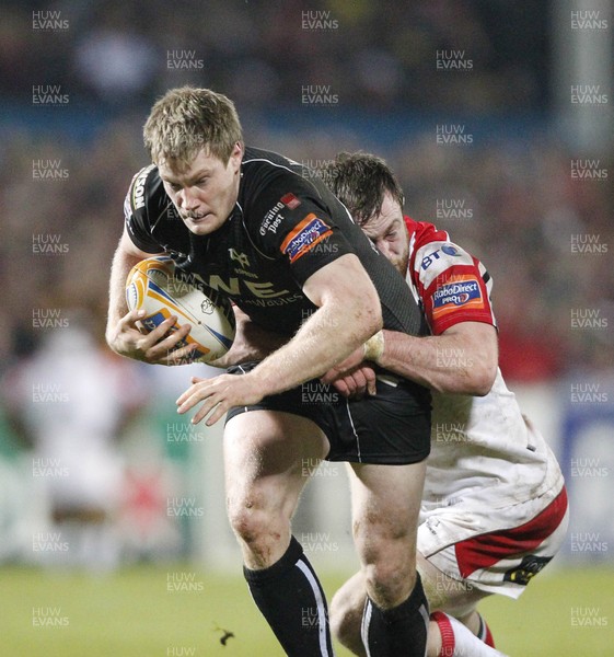 080213 Ulster v Ospreys - RaboDirect Pro12 - Ben John of Ospreys is tackled by Ali Birch of Ulster 