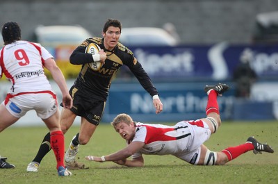 13.04.10 - Ulster v Ospreys - Magners League -  James Hook of Ospreys beats the tackle of Chris Henry of Ulster  