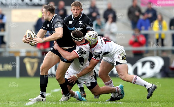 200518 - Ulster v Ospreys - PRO14 Champion's Cup Play-off - Cory Allen of Ospreys is tackled by Luke Marshall and Rob Herring of Ulster