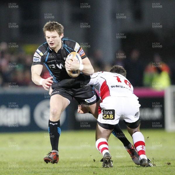 240212 Ulster v Ospreys - RaboDirect Pro 12 - Dan Biggar of Opsreys is tackled by Ruan Pienaar of Ulster