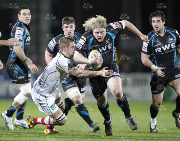 240212 Ulster v Ospreys - RaboDirect Pro 12 - Duncan Jones of Ospreys is tackled by Chris Henry of Ulster