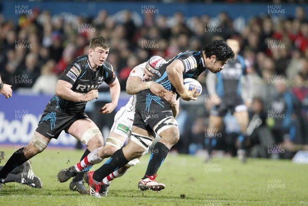 240212 Ulster v Ospreys - RaboDirect Pro 12 - George Stowers of Ospreys is tackled by Dan Tuohy of Ulster