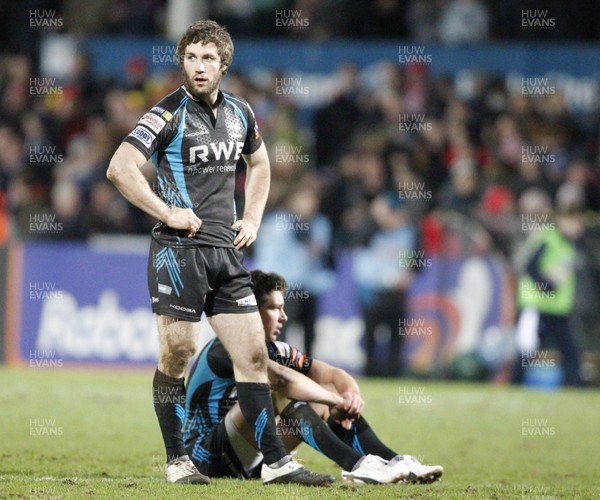 240212 Ulster v Ospreys - RaboDirect Pro 12 - Andrew Bishop and Rhys Webb of Ospreys show their disappointment after the final whistle