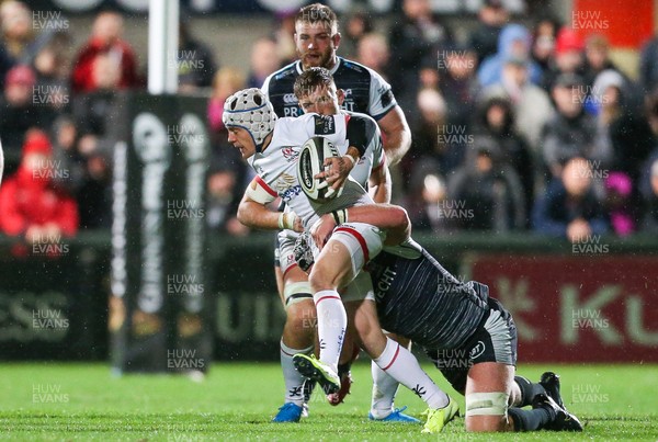 270919 - Ulster v Ospreys - Guinness PRO14 -   Ulster's Michael Lowry is tackled by Osprey's Dan Lydiate