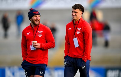 010325 - Ulster v Scarlets - United Rugby Championship - Tomi Lewis of Scarlets, right, walks the pitch before the match