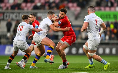 010325 - Ulster v Scarlets - United Rugby Championship - Johnny Williams of Scarlets is tackled by Stuart McCloskey of Ulster