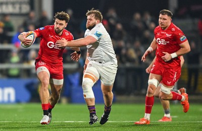 010325 - Ulster v Scarlets - United Rugby Championship - Johnny Williams of Scarlets is tackled by Scott Wilson of Ulster