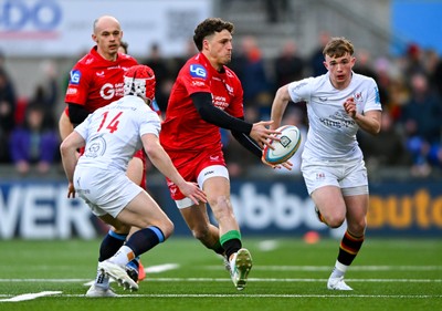 010325 - Ulster v Scarlets - United Rugby Championship - Tomi Lewis of Scarlets in action against Michael Lowry of Ulster