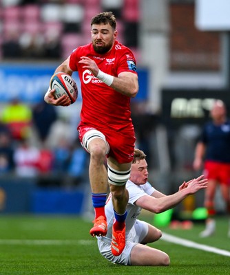 010325 - Ulster v Scarlets - United Rugby Championship - Max Douglas of Scarlets evades the tackle of Jack Murphy of Ulster