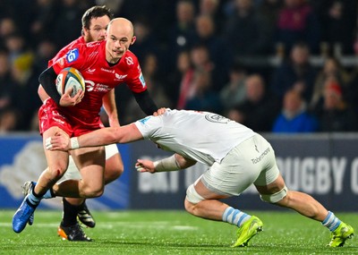 010325 - Ulster v Scarlets - United Rugby Championship - Ioan Nicholas of Scarlets is tackled by Nick Timoney of Ulster