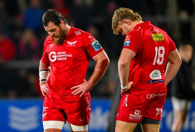 010325 - Ulster v Scarlets - United Rugby Championship - Scarlets players Marnus van der Merwe, left, and Gabe Hawley after their side's defeat