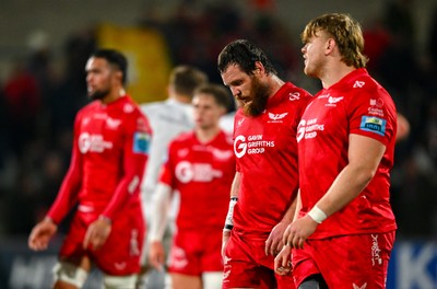 010325 - Ulster v Scarlets - United Rugby Championship - Scarlets players Marnus van der Merwe, left, and Gabe Hawley after their side's defeat