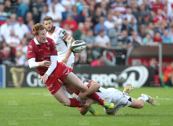 010918 - Ulster v Scarlets - Guinness PRO14 -  Ulster's John Cooney in action with Scarlets Rhys Patchell