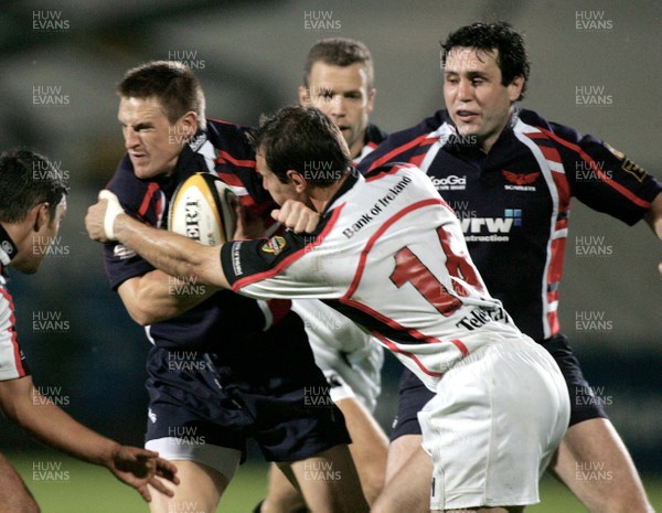 020906 Ulster v Llanelli Scarlets, Magners League -  Mark Bartholomeusz of Ulster and Matthew Watkins of Llanelli 