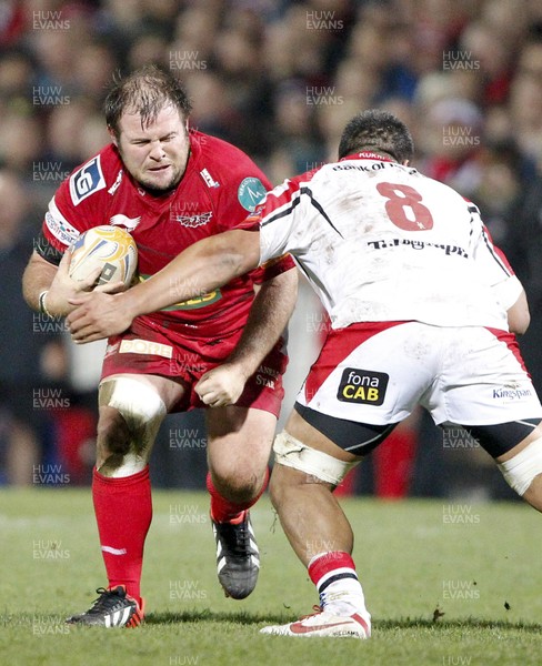 040113 Ulster v Scarlets - RaboDirect Pro 12 - Jacobie Adriaanse of Scarlets is tackled by Nick Williams of Ulster 