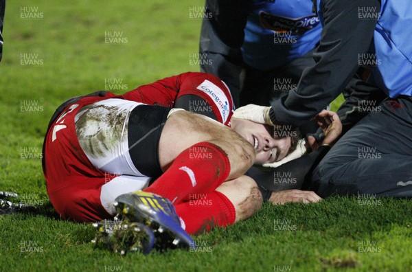 040113 Ulster v Scarlets - RaboDirect Pro 12 - George North of Scarlets receives attention 