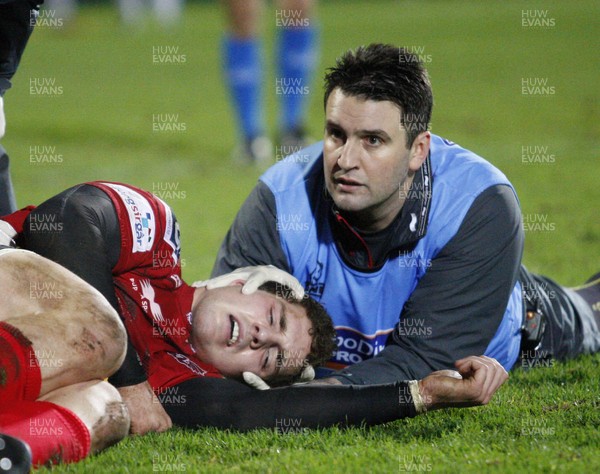 040113 Ulster v Scarlets - RaboDirect Pro 12 - George North of Scarlets receives attention 