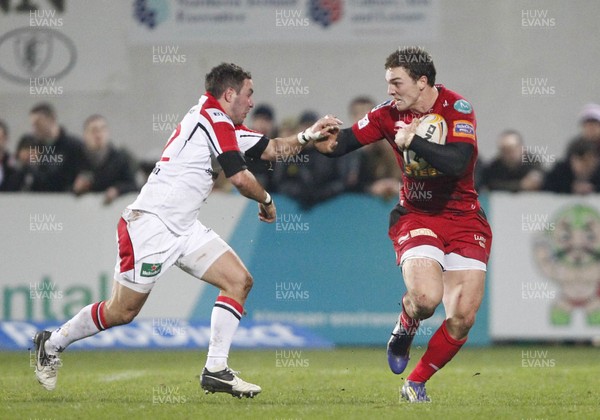 040113 Ulster v Scarlets - RaboDirect Pro 12 - George North of Scarlets is tackled by Paddy Wallace of Ulster 