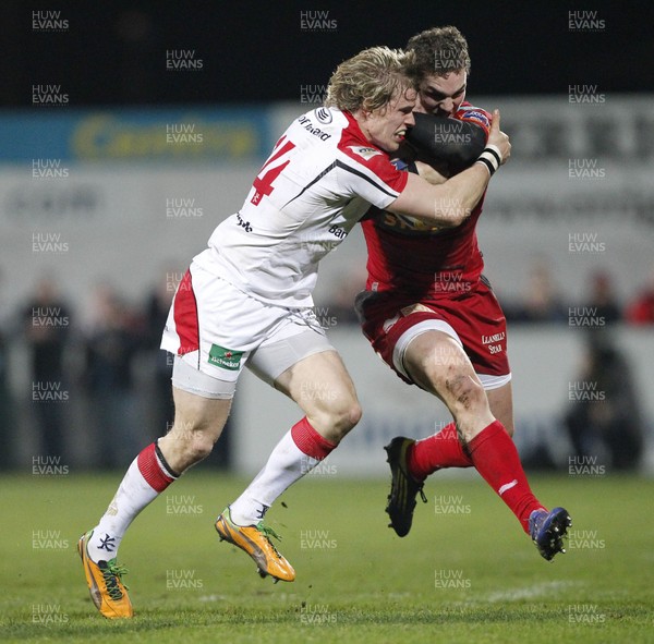 040113 Ulster v Scarlets - RaboDirect Pro 12 - George North of Scarlets becomes injured in this tackle with Ulster's Andrew Trimble 