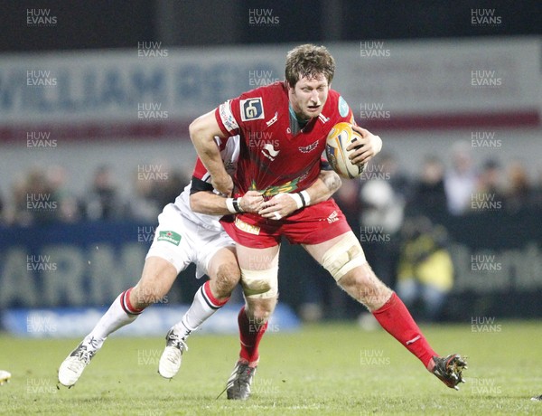 040113 Ulster v Scarlets - RaboDirect Pro 12 - Richard Kelly of Scarlets is tackled by Paddy Wallace of Ulster 