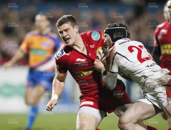 040113 Ulster v Scarlets - RaboDirect Pro 12 - Scott Williams scores the second try for Scarlets despite the attentions of Ulster's Ricky Andrew 