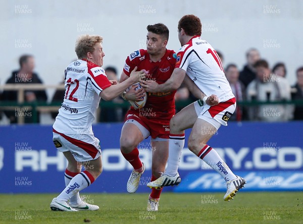 100513 - Ulster v Scarlets - RaboDirect Pro 12 Semi-Final - Owen Williams of Scarlets takes on Stuart Olding and Darren Cave of Ulster 