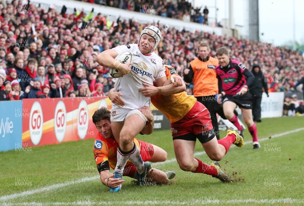 210216 - Ulster v Scarlets - Guinness PRO12 - Ulster's Luke Marshall goes over for a try before being bundled into touch by the Scarlet's DTH van der Merwe and Michael Collins