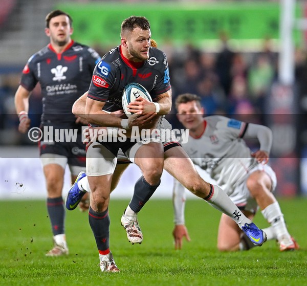 280122 - Ulster v Scarlets - United Rugby Championship - Steff Hughes of Scarlets is tackled by Nathan Doak of Ulster