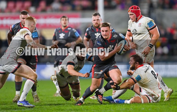 280122 - Ulster v Scarlets - United Rugby Championship - Daf Hughes of Scarlets is tackled by Greg Jones of Ulster