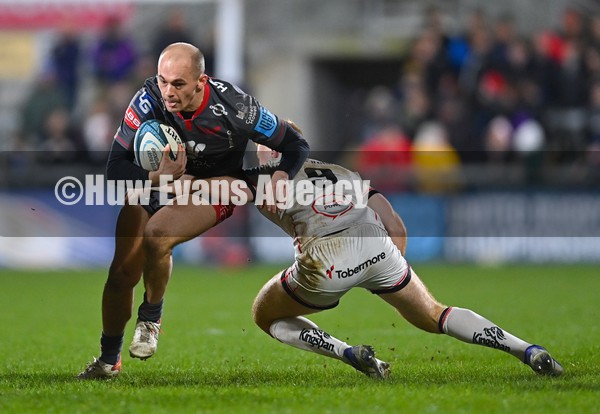 280122 - Ulster v Scarlets - United Rugby Championship - Ioan Nicholas of Scarlets is tackled by Nathan Doak of Ulster