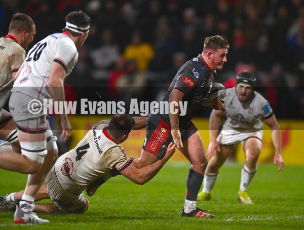 280122 - Ulster v Scarlets - United Rugby Championship - Shaun Evans of Scarlets is tackled by Alan O'Connor of Ulster