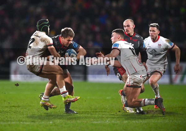 280122 - Ulster v Scarlets - United Rugby Championship - Tyler Morgan of Scarlets is tackled by Angus Curtis of Ulster