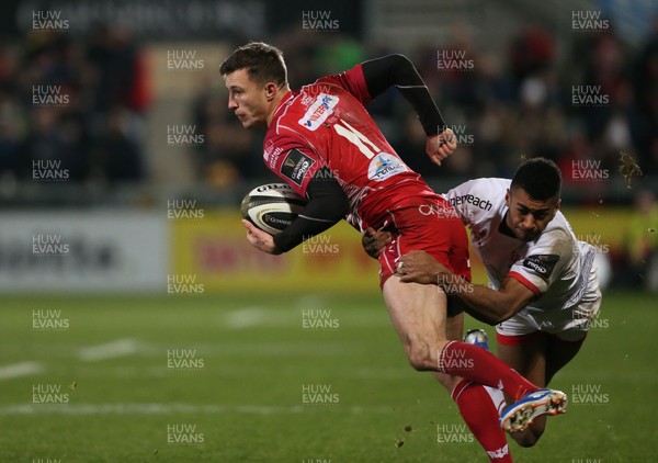 291119 - Ulster v Scarlets - Guinness PRO14 -  Ulster's Robert Baloucoune and Scarlet's Morgan Williams