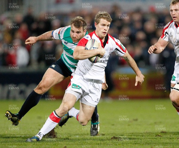 071213 - Ulster v Treviso - Heineken Cup - Andrew Trimble of Ulster breaks past Alberto de Marchi and Lorenzo Cittadini of Treviso(c) Huw Evans Agency