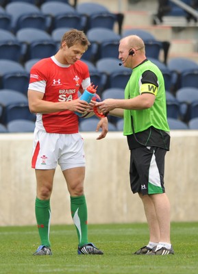 06.06.09 - USA Eagles v Wales - Wales' Dan Biggar kicks at goal as Neil Jenkins looks on. 