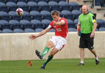 06.06.09 - USA Eagles v Wales - Wales' Dan Biggar kicks at goal as Neil Jenkins looks on. 