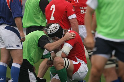 06.06.09 USA v Wales... Wales' Ryan Jones is treated before going off. 